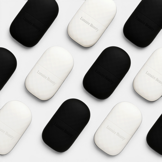 Black and white beauty product cases with 'Luminous Beauty' branding on a white background
