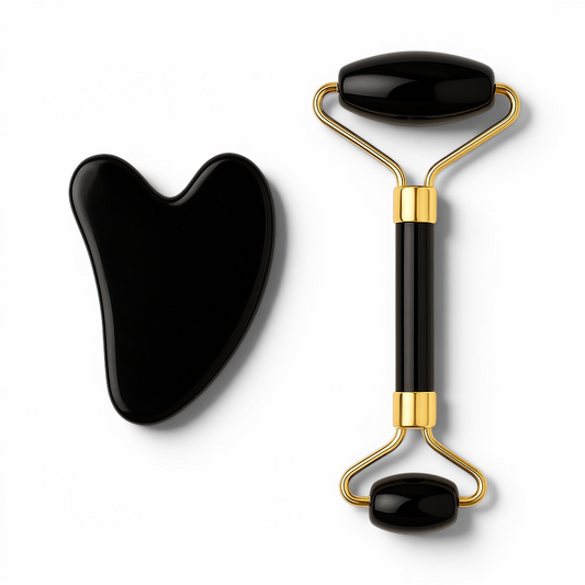 Black facial roller and gua sha tool on a white background