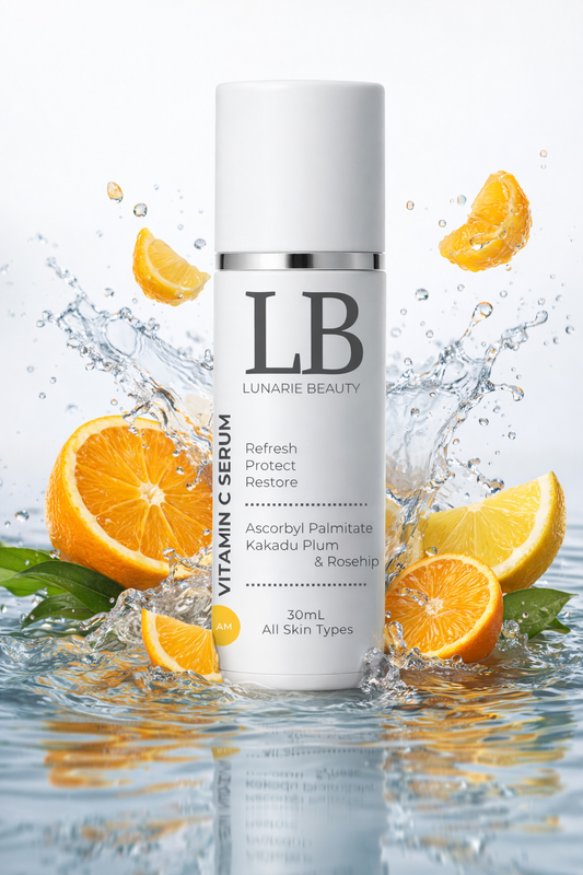 LB Vitamin C Serum bottle with oranges and water splash on a white background