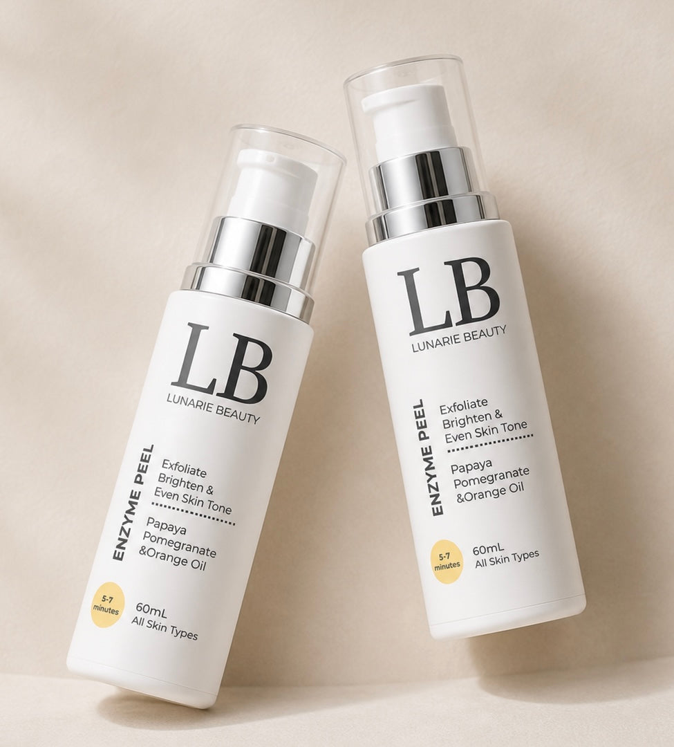 Two bottles of Lunar Beauty skincare products on a beige background