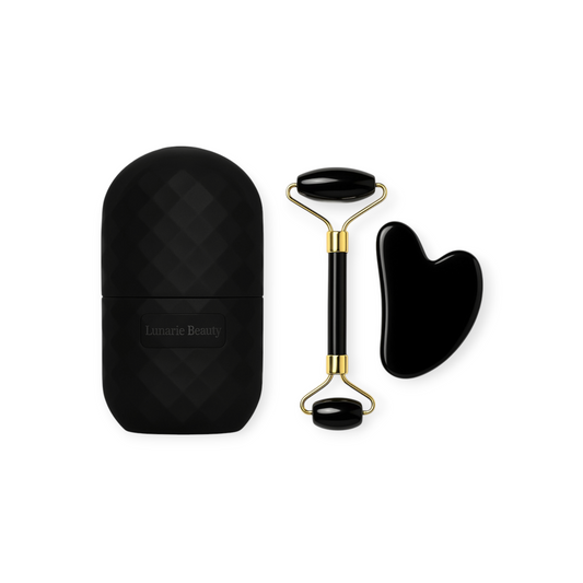 Black facial roller and gua sha tool with black case on a white background