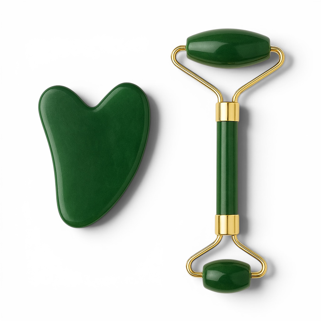 Green jade roller and gua sha tool on a white background
