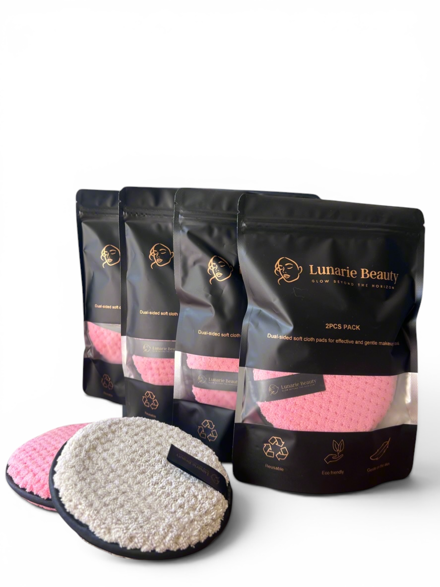 Packaging of Lunarie Beauty products with pink and white pads on a gray background